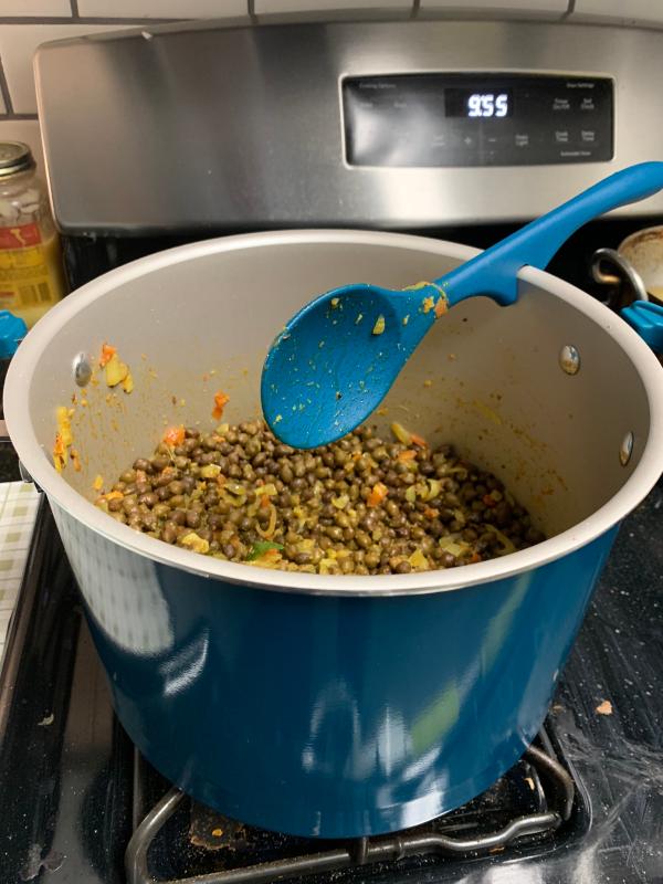 Curry cooked for 10 people in large pot.