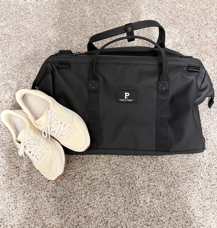Customer photo for "Sturdy and Stylish Carry On"