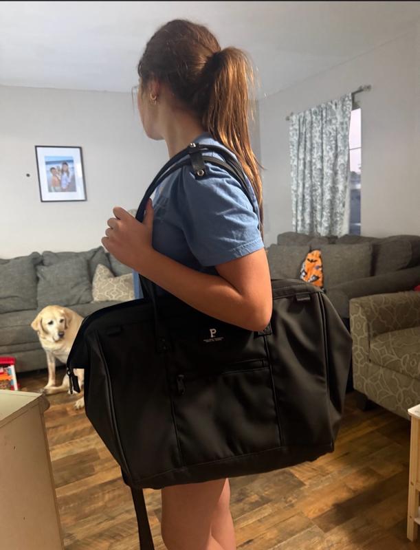 Customer photo for "Very well made and has nice compartments inside!"