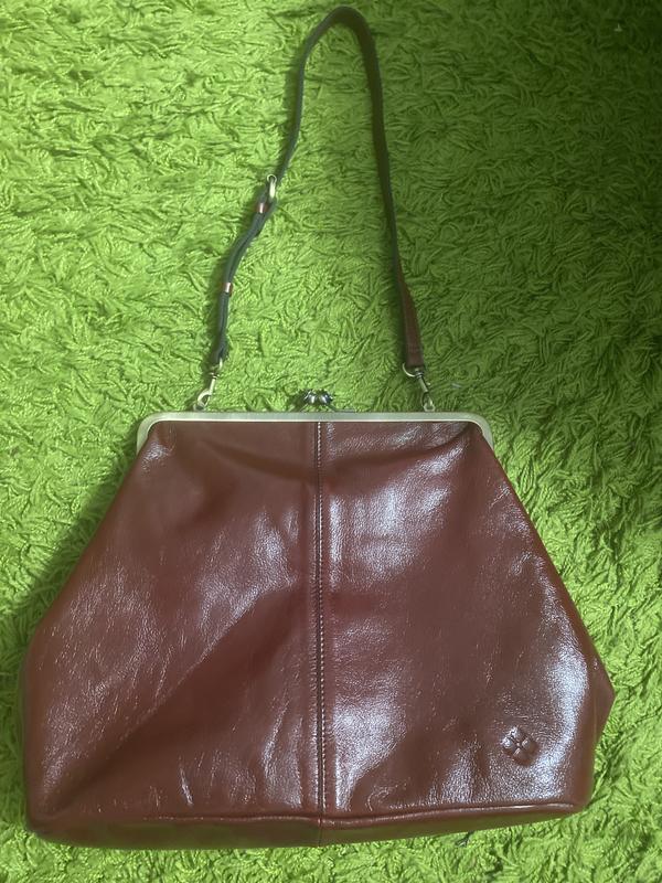 This bag is beautiful the leather is soft the shine on the bag is amazing