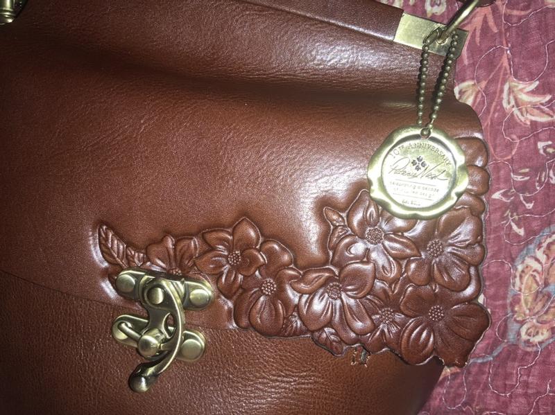 Close up of purse with 10 year anniversary emblem