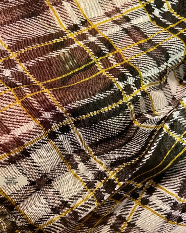 Showing 1 layer, semi sheer, part of hand visible