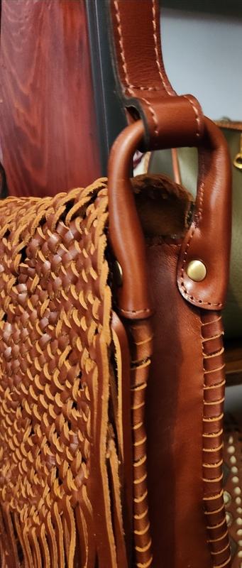 Leather trim and whipstitching