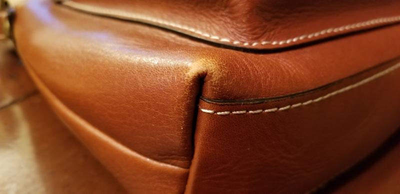 Love the design. Question the quality of the leather.