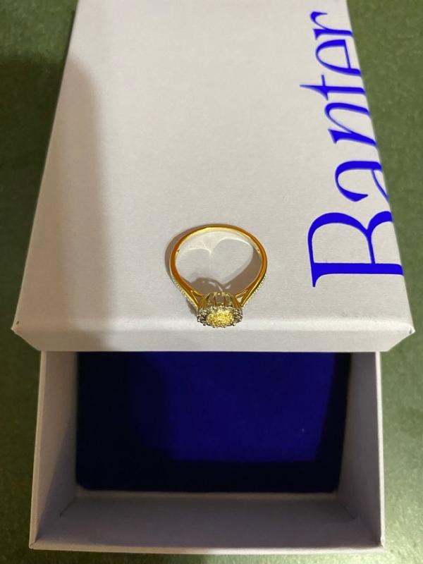 1/10 CT. T.W. Diamond Flower Frame Ring in 10K Gold | Banter