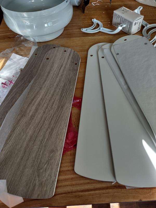 White on one side or flip for the lighter brown on the other