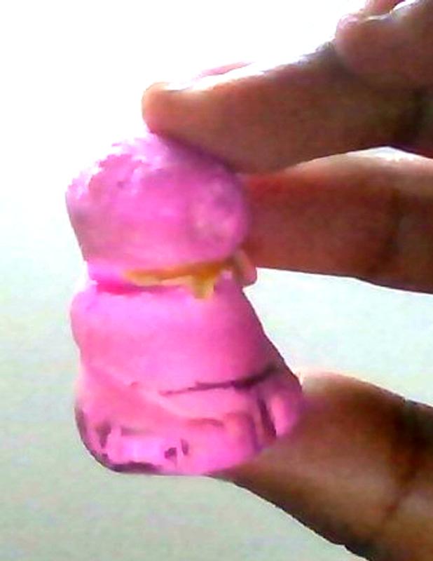 Sorry the yellow on his neck is glitter glue that I left from a project.