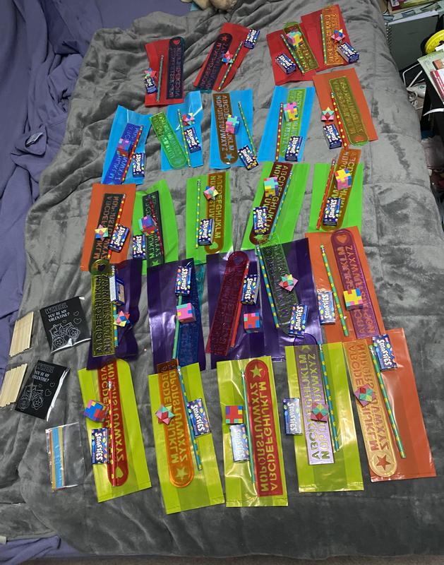 The colourful items behind the toys are the bags.