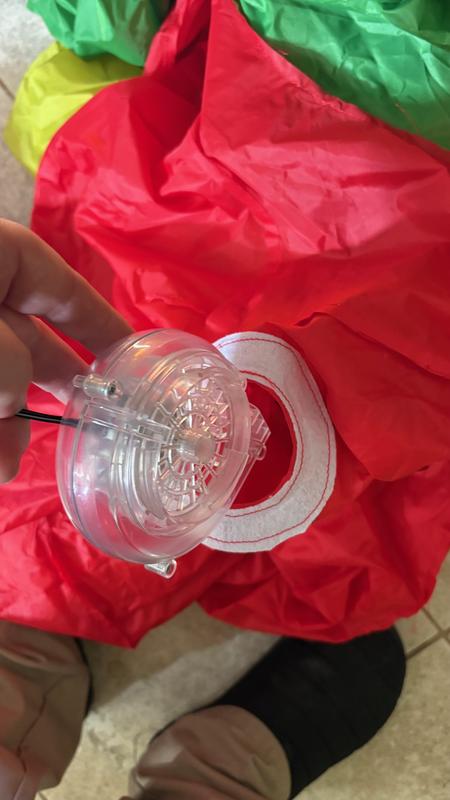 The fan and the seal broke to allow the costume to inflate.