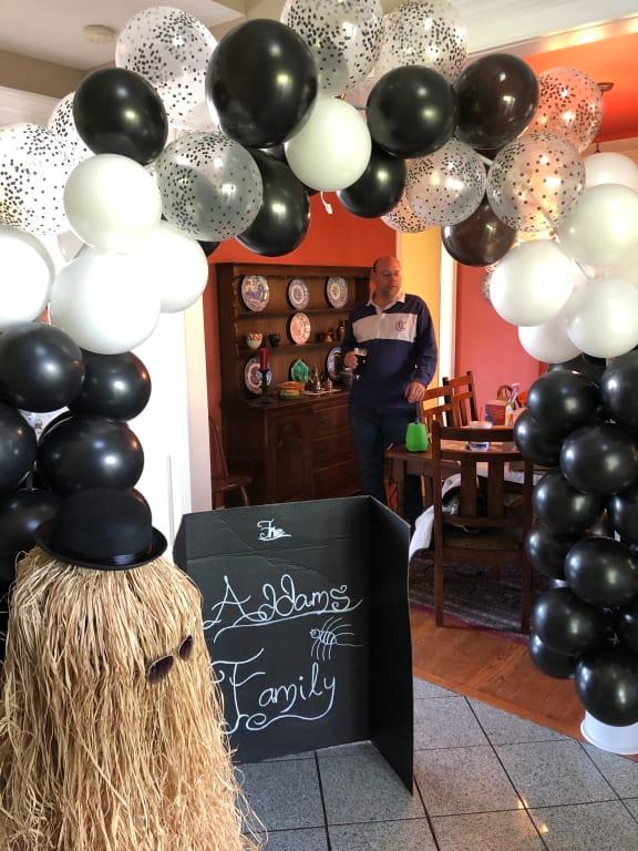 Halloween decorations with the Adam's Family theme