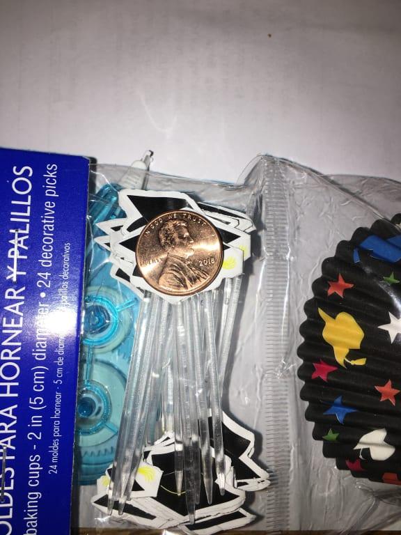 Had to use my white-out cartridge to balance the package. Picks are as big as a penny and sticks out just a bit on each side.