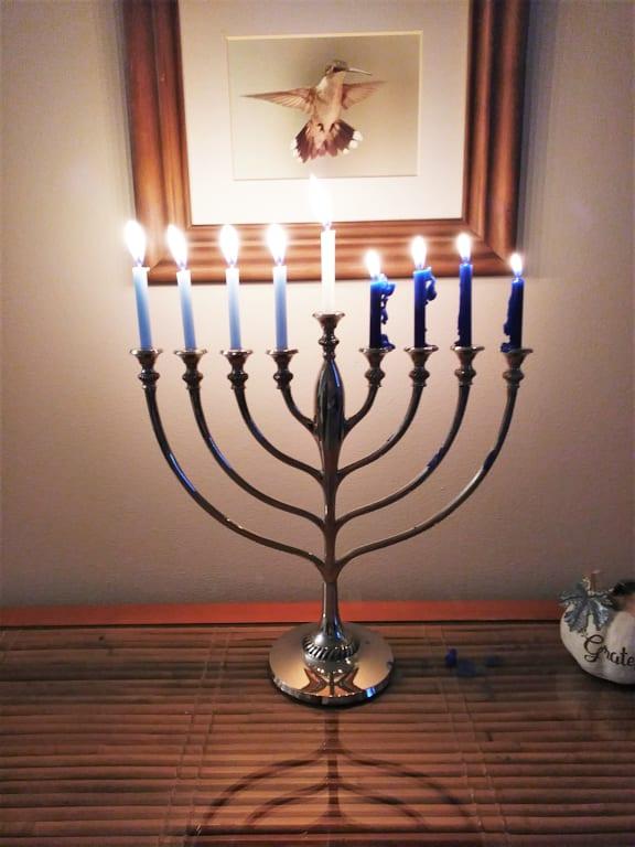 Dark blue candles quickly melted out of shape