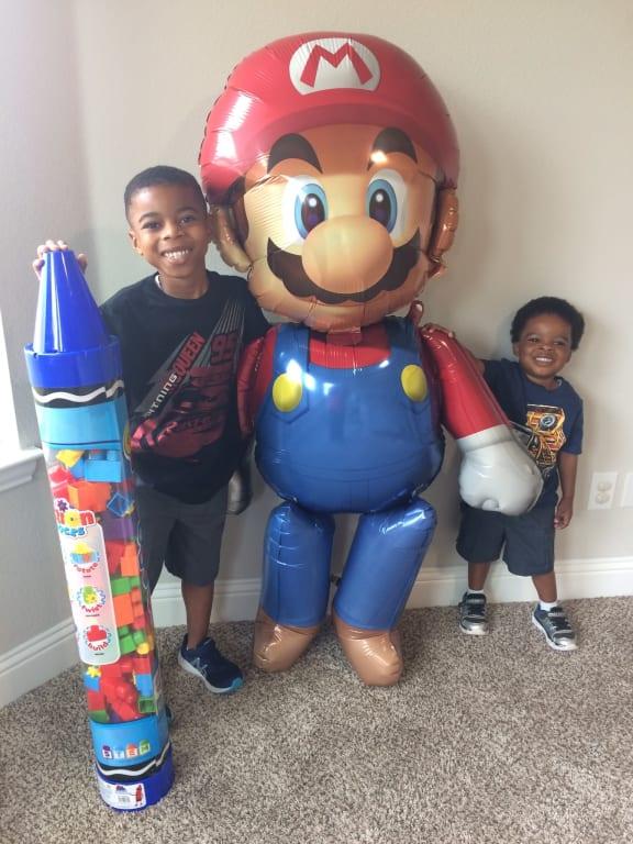7 and 2 year old with Mario