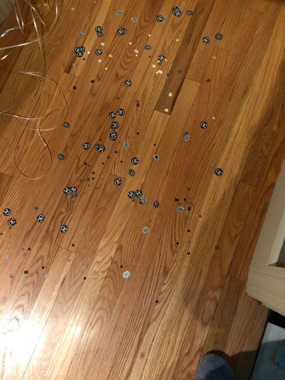 Confetti on the floor outside her room.