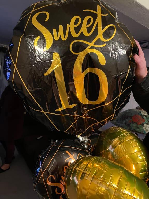 Me holding up the balloon.