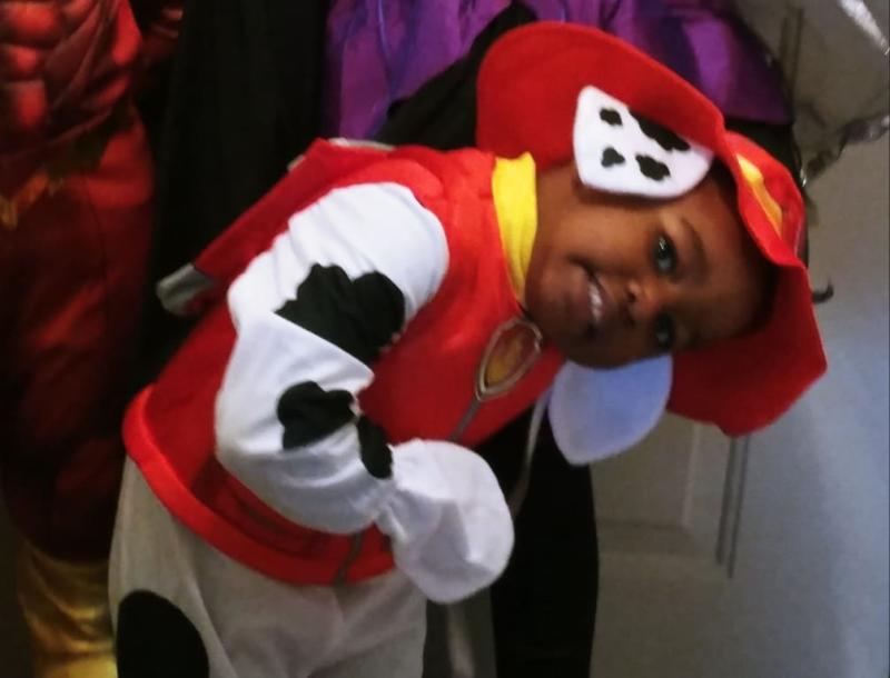 He's showing off the back pack