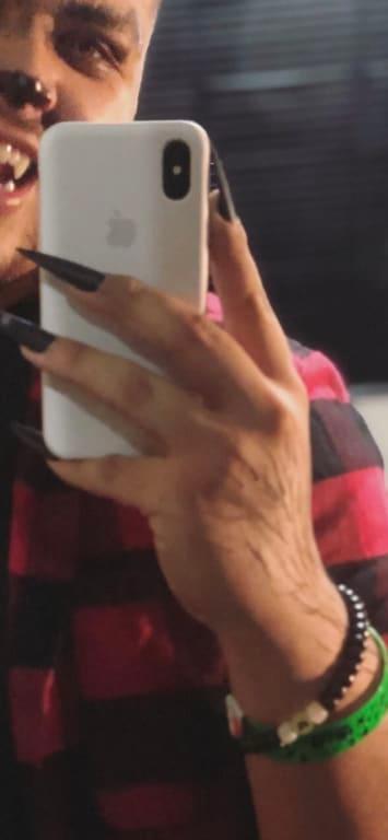 Nails next to iPhone X (for size comparison)