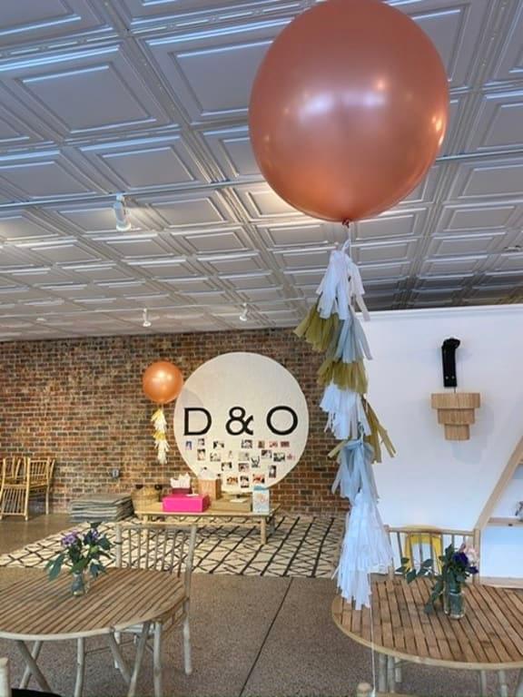 I added balloon tassels made from tissue paper and restringed with white twine