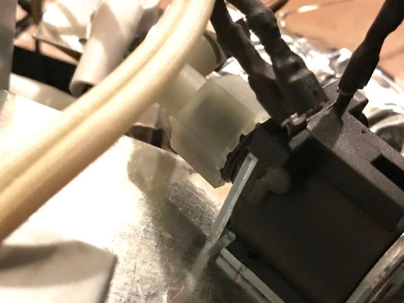 Transfer screw on cap, remove metal tube by unscrewing, tighten plastic cap resulting in same general angle to the right, insert metal tube and tighten