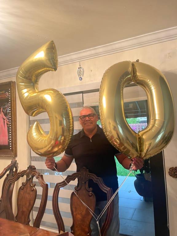 My husband so happy with his balloons