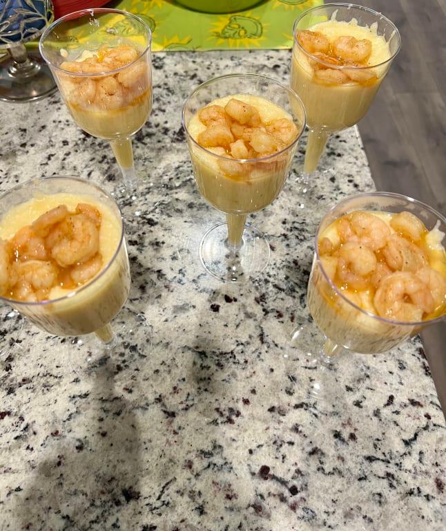 Shrimp and grits in plastic wine stem