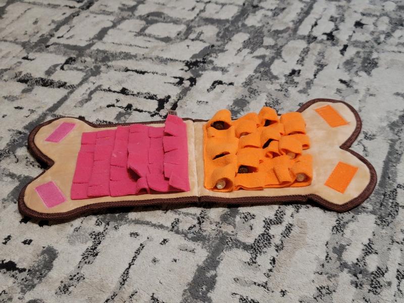 Only orange side has loops for treats