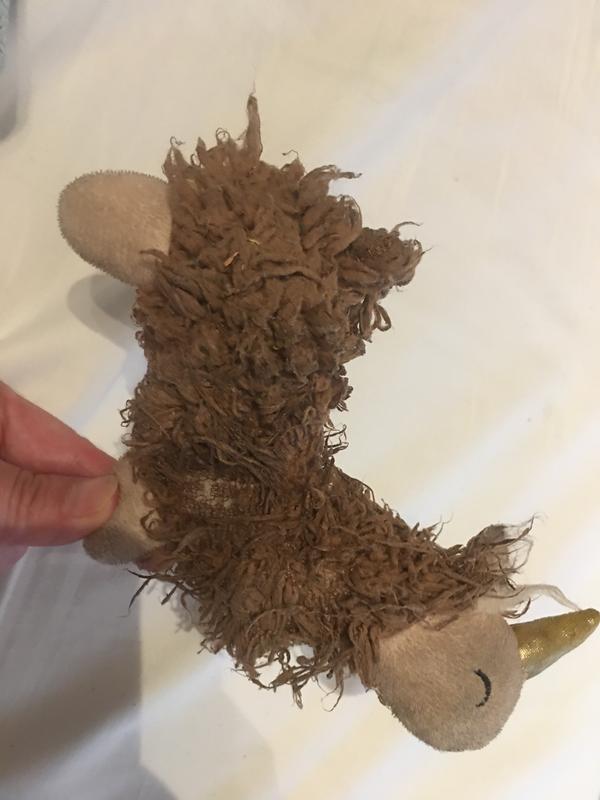 Well loved but worn out. Good for a small (supervised!) puppy
