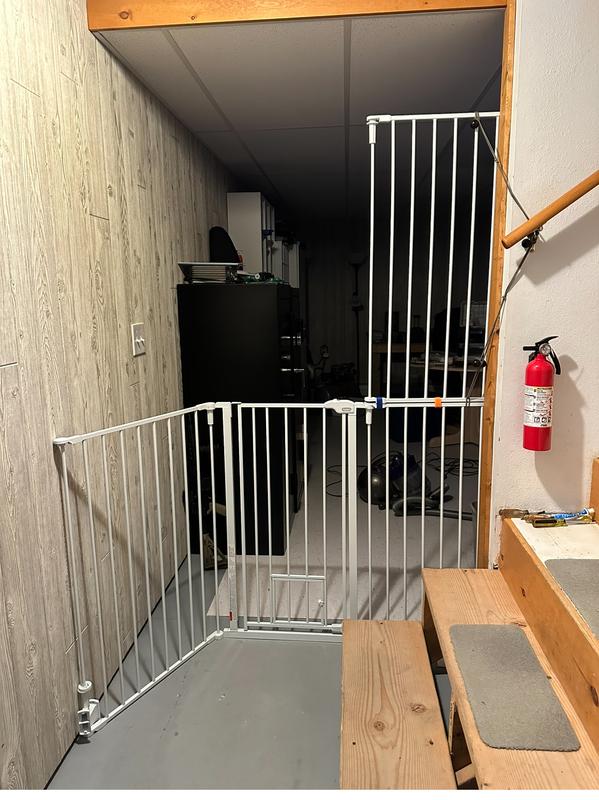 3rd piece from stairway gate used to make gate taller