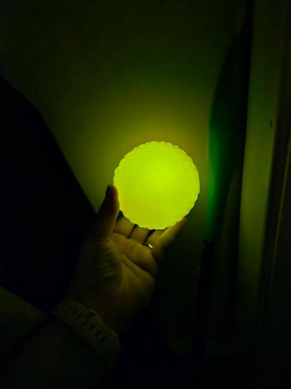Glowing ball in the dark after about 30 seconds held near a light bulb