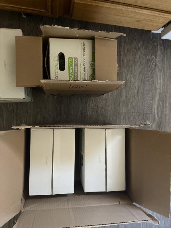 smaller box is the one leaving litter everywhere i put it and the right one is taped up no litter