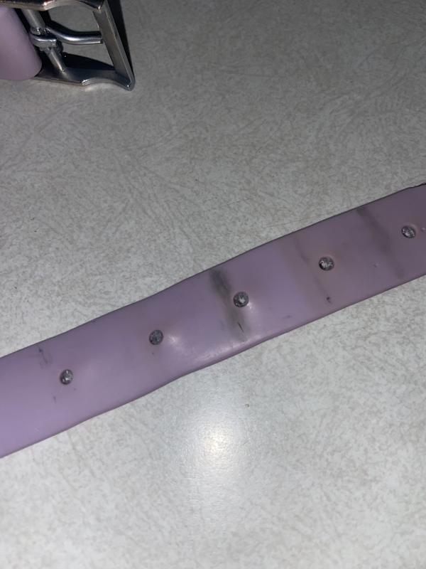 Material falling apart and permanent stains from the buckle