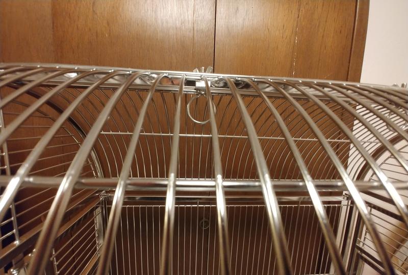 The ring thing at top middle is a toy holder.  Two are included with cage.