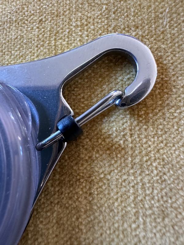 Black keeper locks clasp from accidental pressing