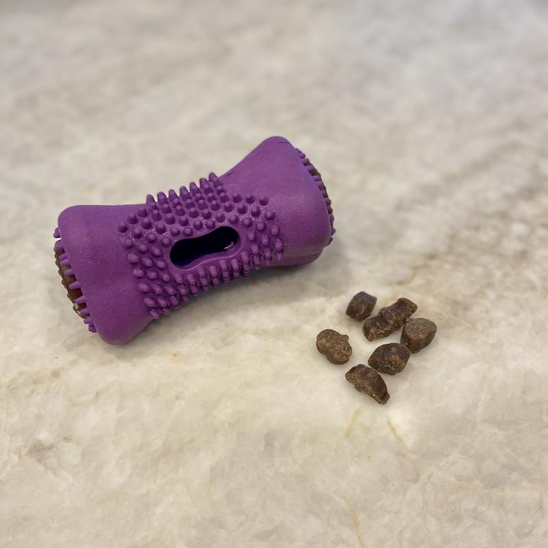 The opening is designed to allow smaller treats to be easily added but is big enough for the treats to come out after a little maneuvering.