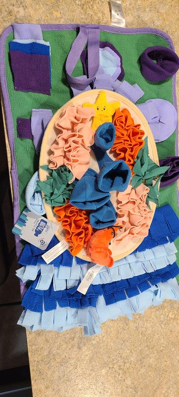 The snuffle mat on the bottom is what I would consider large. This one is marked extra large