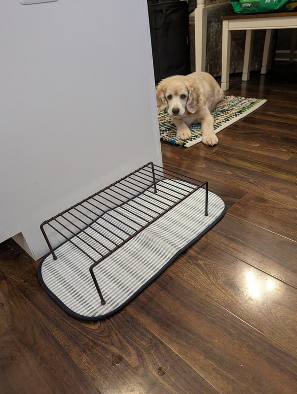 Places the mat under my dog's bowl lift. It is a great help and reduces slippage.