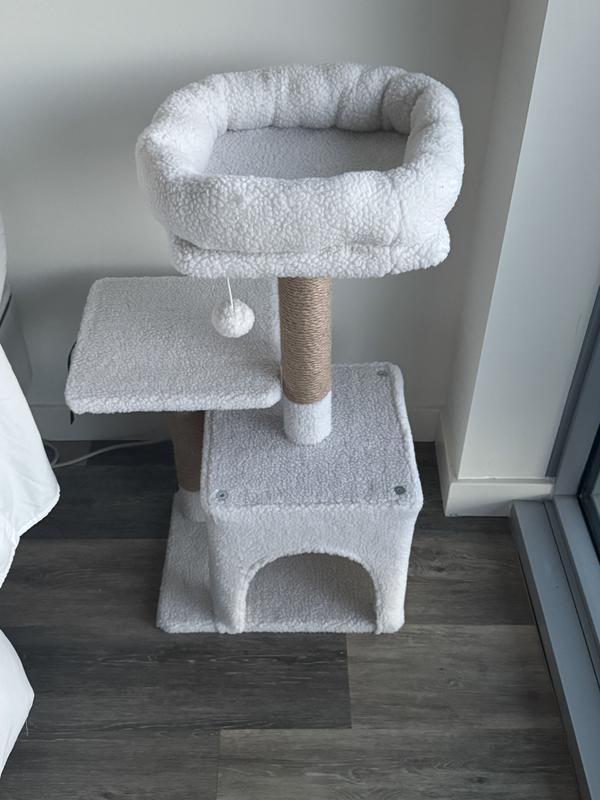 Beautiful white cat condo.
