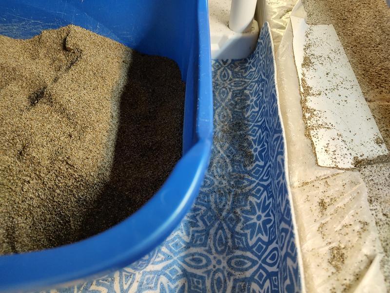 Our old mat and the mess of litter around it