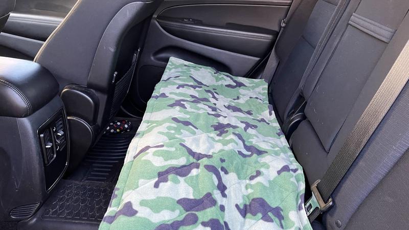 Great fit for back of Jeep grand Cherokee. Will keep muddy paws off upholstery come spring. Soft, felty fabric.