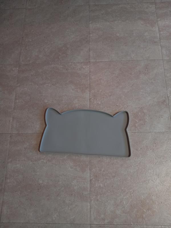 The placemat is cute and functional.  It definitely helps keep the feeding area clean.