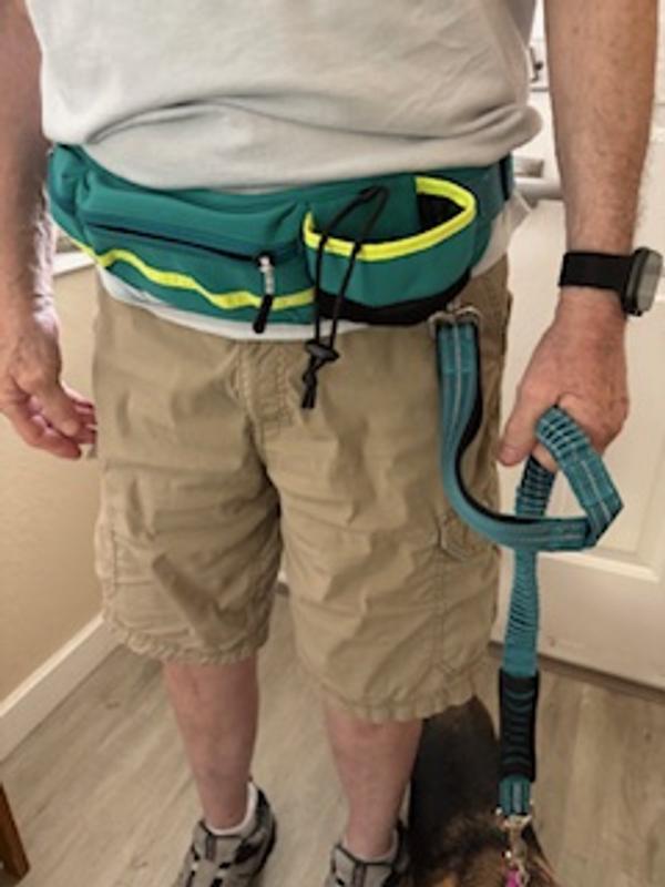 Convenient water bottle holder and center pocket.