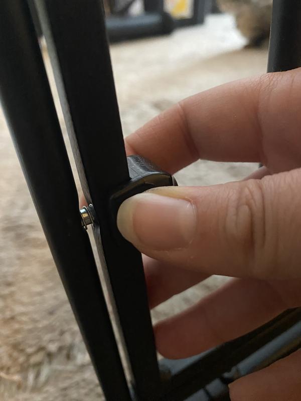 Smaller latch on the tiny gate! Simply grab and pull to the side to open.