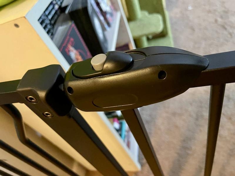 Press the top gray button and slide to open the gate! Lovely latch.