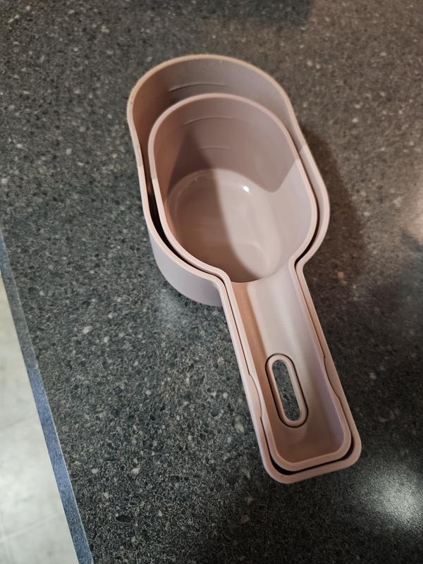 Scoops lock together at the handle for easy storage.