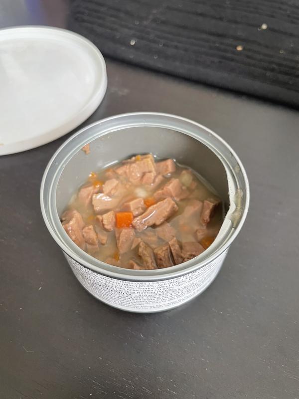About half empty since the cat refuses to wait once I open a can