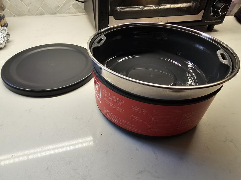 Dog bowl set with just the lid off and leaving the first plastic insert tray.