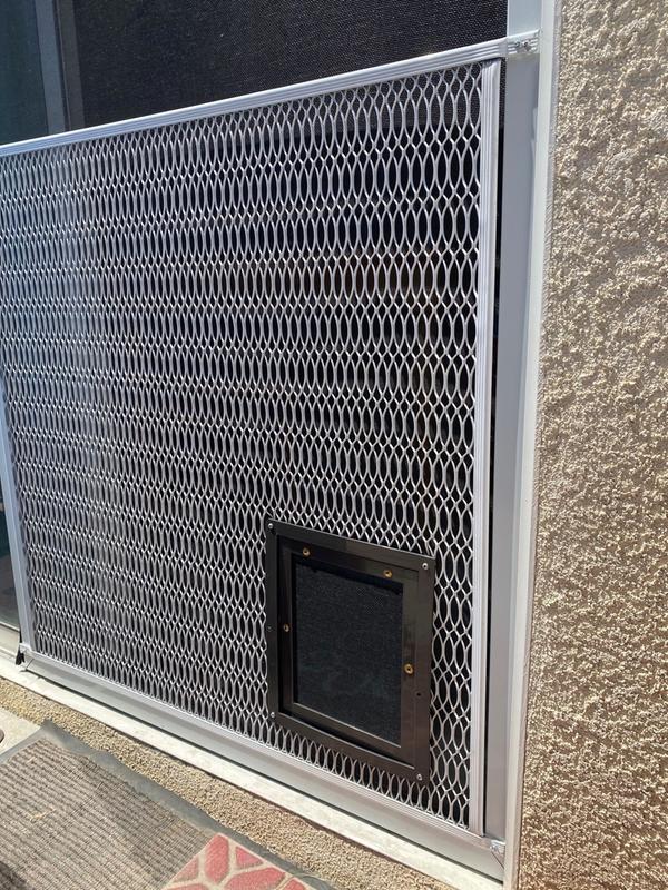 Metal screen door 2024 with dog door