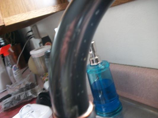 clear coat failing on the faucet arch