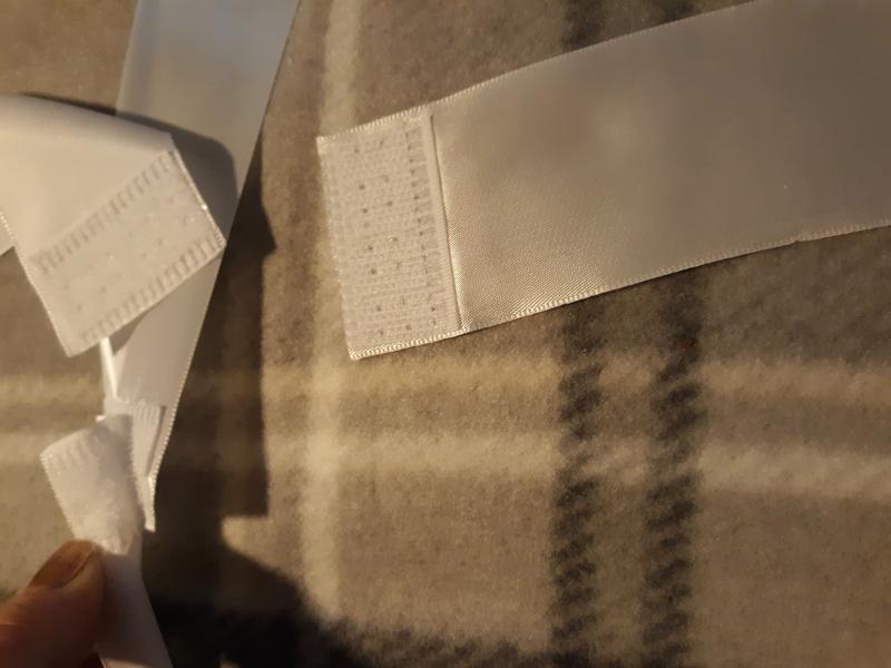 Here is the the ribbon that is actually Velcro that goes around to hold the blanket in place
