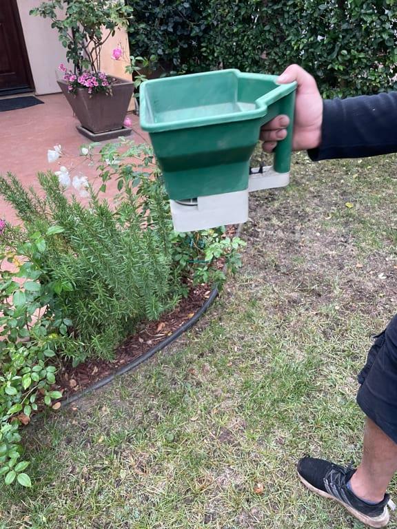 Prep for lawn and disbursing seeds